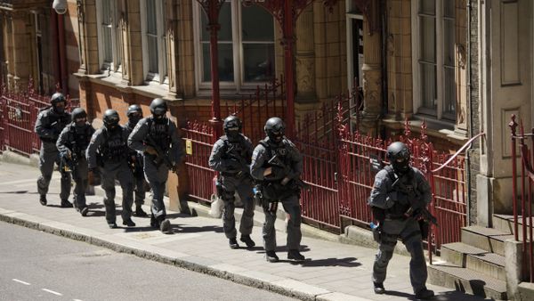 During a training exercise for London's emergency services, armed police officers walk towards the disused Aldwych underground train station in London, Tuesday, June 30, 2015 During a training exercise for London's emergency services, armed police officers walk towards the disused Aldwych underground train station in London, Tuesday, June 30, 2015 - Sputnik International