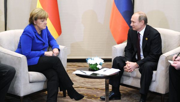 November 15, 2015. Russian President Vladimir Putin and German Chancellor Angela Merkel during a meeting on the sidelines of the Group of 20 summit in Antalya, Turkey November 15, 2015. Russian President Vladimir Putin and German Chancellor Angela Merkel during a meeting on the sidelines of the Group of 20 summit in Antalya, Turkey - Sputnik International
