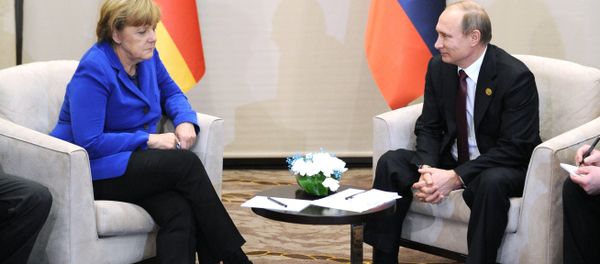 November 15, 2015. Russian President Vladimir Putin and German Chancellor Angela Merkel during a meeting on the sidelines of the Group of 20 summit in Antalya, Turkey November 15, 2015. Russian President Vladimir Putin and German Chancellor Angela Merkel during a meeting on the sidelines of the Group of 20 summit in Antalya, Turkey - Sputnik International