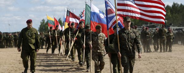 Soldiers from NATO countries attend an opening ceremony of military exercise 'Saber Strike 2015', at the Gaiziunu Training Range in Pabrade some 60km.(38 miles) north of the capital Vilnius, Lithuania, Monday, June 8, 2015 - Sputnik International