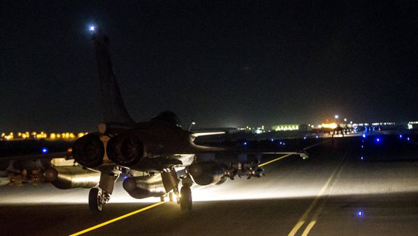 A French fighter jet taxis along the runway in an undisclosed location, in this handout picture released by the ECPAD late November 15, 2015 A French fighter jet taxis along the runway in an undisclosed location, in this handout picture released by the ECPAD late November 15, 2015 - Sputnik International