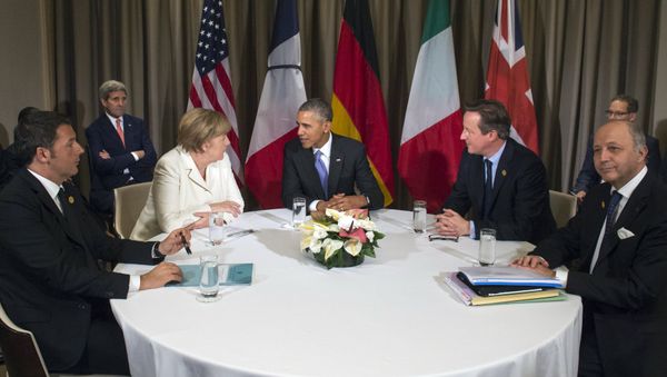 (L to R) Italian Prime Minister Matteo Renzi, German Chancelor Angela Merkel, US President Barack Obama, British Prime Minister David Cameron and French Foreign Minister Laurent Fabius attend a meeting during the G20 Summit in Antalya, on November 16, 2015 (L to R) Italian Prime Minister Matteo Renzi, German Chancelor Angela Merkel, US President Barack Obama, British Prime Minister David Cameron and French Foreign Minister Laurent Fabius attend a meeting during the G20 Summit in Antalya, on November 16, 2015 - Sputnik International