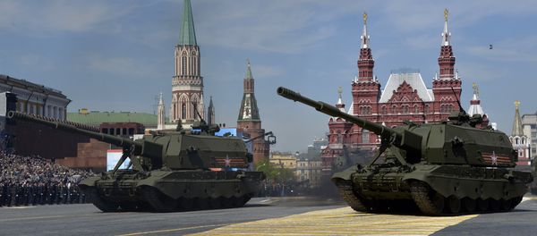 Russian 2S-35 Coalition-SV self-propelled 152 mm howitzers drive during the Victory Day military parade at Red Square in Moscow on May 9, 2015 Russian 2S-35 Coalition-SV self-propelled 152 mm howitzers drive during the Victory Day military parade at Red Square in Moscow on May 9, 2015 - Sputnik International