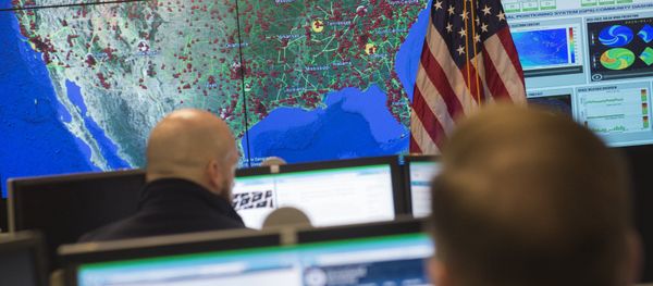 Staff members sit at their work stations at the National Cybersecurity and Communications Integration Center in Arlington, Virginia, January 13, 2015 - Sputnik International