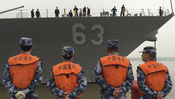 Chinese Navy personnel stand watch the guided missile destroyer USS Stethem arrives at the Shanghai International Passenger Quay for a scheduled port visit in Shanghai, China, Monday, Nov. 16, 2015. Chinese Navy personnel stand watch the guided missile destroyer USS Stethem arrives at the Shanghai International Passenger Quay for a scheduled port visit in Shanghai, China, Monday, Nov. 16, 2015. - Sputnik International