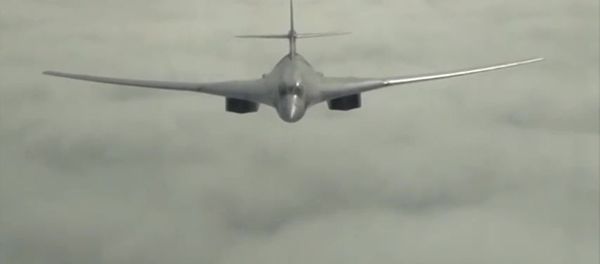A Russian Tupolev 160 long-range bomber during a mission to launch an air strike on the Islamic State infrastructure in Syria A Russian Tupolev 160 long-range bomber during a mission to launch an air strike on the Islamic State infrastructure in Syria - Sputnik International