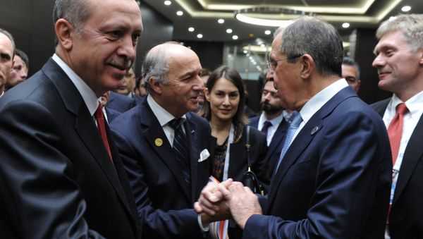 Foreground, from left: Turkish President Recep Tayyip Erdogan, French Foreign Minister Laurent Fabius, Russian Foreign Minister Sergei Lavrov, and Kremlin Deputy Chief of Staff and Russian Presidential Press Secretary Dmitry Peskov during the G20 summit in Antalya, Turkey, November 15, 2015. - Sputnik International