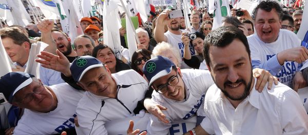 Italian Lega Nord (Northern League) party Matteo Salvini, second right, poses for pictures with supporters during a protest to demand the Italian government keep out immigrants in Rome Italian Lega Nord (Northern League) party Matteo Salvini, second right, poses for pictures with supporters during a protest to demand the Italian government keep out immigrants in Rome - Sputnik International