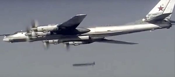 Russian Tu-95 bomber launches a cruise missile at a target in Syria Russian Tu-95 bomber launches a cruise missile at a target in Syria - Sputnik International