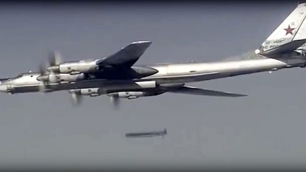 Russian Tu-95 bomber launches a cruise missile at a target in Syria Russian Tu-95 bomber launches a cruise missile at a target in Syria - Sputnik International