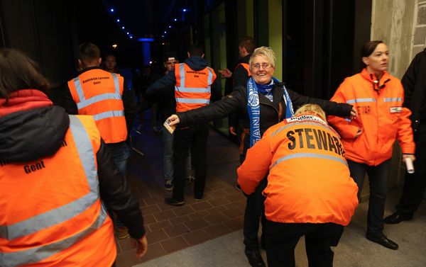 Security guards search fans as they enter the stadium before the Jupiler Pro League match between KAA Gent and Westerlo, in Gent, on November 20, 2015, as part of security measures set following Paris' attacks. - Sputnik International