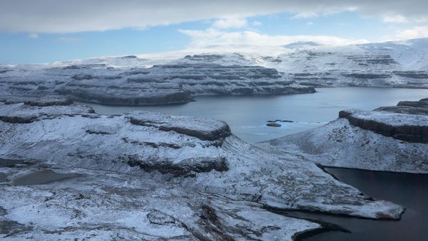An aerial view taken on September 5, 2012 shows the Kerguelen archipelago which forms one of the five districts of the territory of the French Southern and Antarctic Lands (TAAF) - Sputnik International