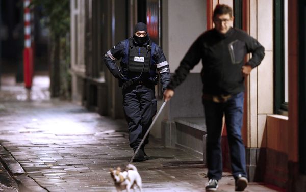 Belgian police officers search the area during a continued high level of security following the recent deadly Paris attacks in Brussels Belgian police officers search the area during a continued high level of security following the recent deadly Paris attacks in Brussels - Sputnik International