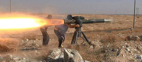 In this picture released on June 26, 2015, by a website of Islamic State militants, Islamic State militants fire an anti-tank missile in Hassakeh, northeast Syria - Sputnik International