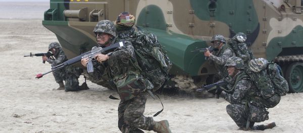 South Korean Marines come out from a landing craft during a landing exercise on the beach in Taean, western South Korea, Monday, June 29, 2015 South Korean Marines come out from a landing craft during a landing exercise on the beach in Taean, western South Korea, Monday, June 29, 2015 - Sputnik International