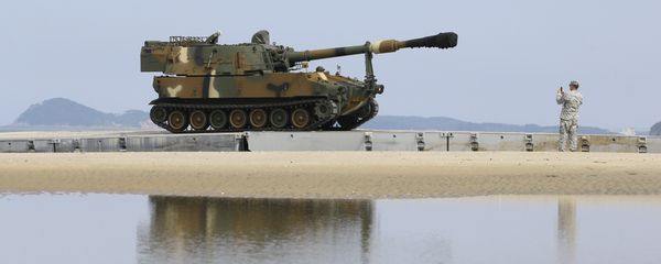 South Korean army's K-55 self-propelled artillery vehicle is deployed on U.S. military's 560-meter temporary trident pier from a barge during a Combined Joint Logistics Over-the-Shore exercise of U.S. and South Korea Combined Forces Command at the Anmyeon beach in Taean, South Korea, Monday, July 6, 2015 South Korean army's K-55 self-propelled artillery vehicle is deployed on U.S. military's 560-meter temporary trident pier from a barge during a Combined Joint Logistics Over-the-Shore exercise of U.S. and South Korea Combined Forces Command at the Anmyeon beach in Taean, South Korea, Monday, July 6, 2015 - Sputnik International