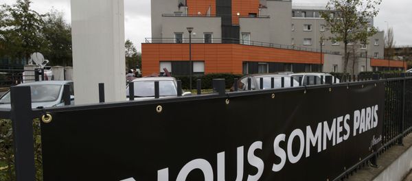 A general view shows the Appart'City hotel in Alfortville, near Paris, France, November 17, 2015 where two rooms were rented by Paris attacks suspect Salah Abdeslam, actively wanted in France and Belgium, according to sources close to the investigation. The banner reads We are Paris - Sputnik International