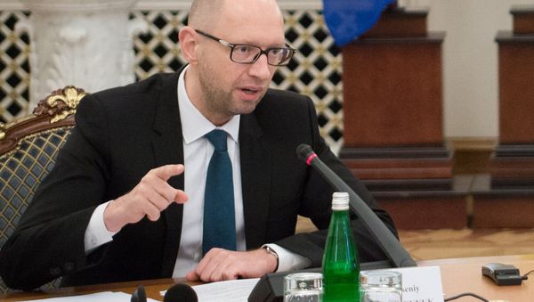 Ukrainian Prime Minister Arseny Yatsenyuk seen here during a meeting of the Defense and Security Council of Ukraine - Sputnik International