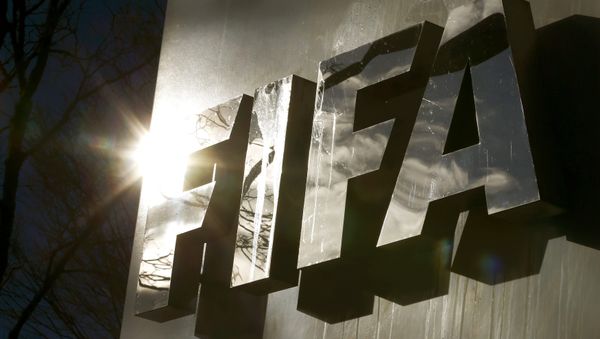 The sun is reflected in FIFA's logo in front of FIFA's headquarters in Zurich, Switzerland November 19, 2015 The sun is reflected in FIFA's logo in front of FIFA's headquarters in Zurich, Switzerland November 19, 2015 - Sputnik International
