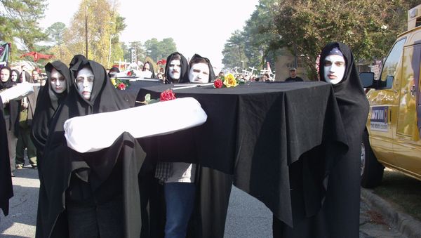 Protesters prepare to march to Fort Benning's front gate Sunday, Nov.18, 2001, in Columbus, Ga., to protest a former Army school they blame for alleged human rights violations against Latin American civilians. - Sputnik International