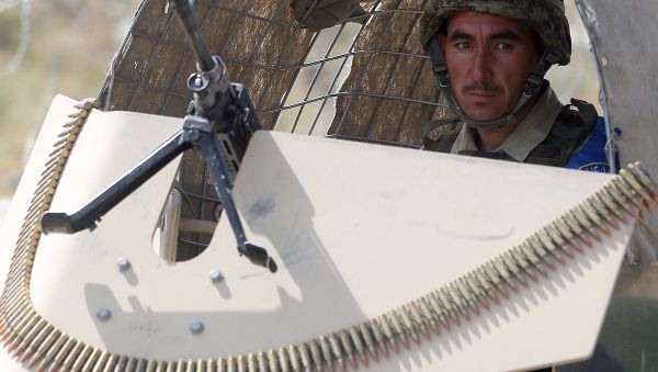 A soldiers looks on while Afghan security forces take part in an exercise in Kabul Garrison compound, in Kabul, Afghanistan, Wednesday, Oct. 7, 2015. - Sputnik International
