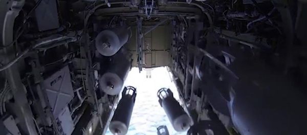 The bomb-door of the Tu-22 M3 missile-carrying bomber, the Russian aerospace forces, on its operational mission to deliver air strikes at ISIS targets in Syria - Sputnik International