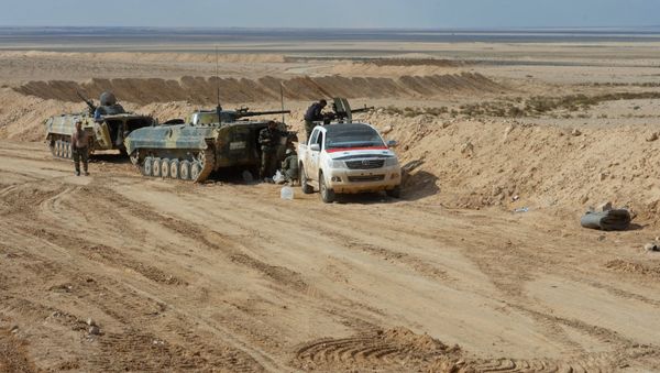 Syrian Arab Army soldiers on combat position near the city of Palmyra - Sputnik International