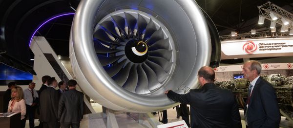 Visitors at the PD-14 aircraft engine displayed by the United Engine Corporation at the MAKS-2015 air show in Zhukovsky in the Moscow Region Visitors at the PD-14 aircraft engine displayed by the United Engine Corporation at the MAKS-2015 air show in Zhukovsky in the Moscow Region - Sputnik International