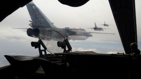 Russian Air Force Su-24 bombers fly during a military exercise in southern Russia on February 11, 2015 Russian Air Force Su-24 bombers fly during a military exercise in southern Russia on February 11, 2015 - Sputnik International