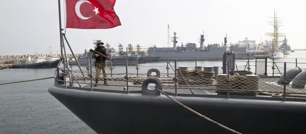 A Turkish marine serviceman stands on the deck of a Turkish navy TCG Turgutreis vessel in the Black Sea port. A Turkish marine serviceman stands on the deck of a Turkish navy TCG Turgutreis vessel in the Black Sea port. - Sputnik International