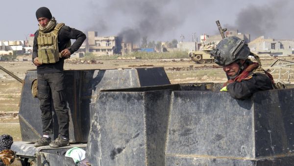 Iraq forces supported by U.S.-led coalition airstrikes advance their position during clashes with Islamic State group in the western suburbs of Ramadi, the capital of Iraq's Anbar province. Iraq forces supported by U.S.-led coalition airstrikes advance their position during clashes with Islamic State group in the western suburbs of Ramadi, the capital of Iraq's Anbar province. - Sputnik International