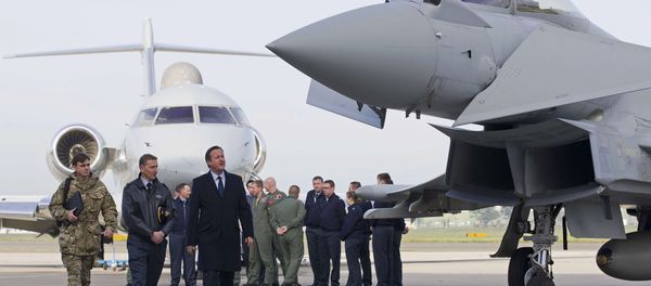 Britain's Prime Minister David Cameron (3rd L) looks at an RAF Eurofighter Typhoon fighter jet during his visit to Royal Air Force station RAF Northolt in London, Britain November 23, 2015. Britain's Prime Minister David Cameron (3rd L) looks at an RAF Eurofighter Typhoon fighter jet during his visit to Royal Air Force station RAF Northolt in London, Britain November 23, 2015. - Sputnik International