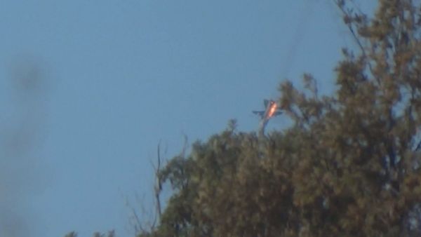 A war plane crashes in flames in a mountainous area in northern Syria after it was shot down by Turkish fighter jets near the Turkish-Syrian border A war plane crashes in flames in a mountainous area in northern Syria after it was shot down by Turkish fighter jets near the Turkish-Syrian border - Sputnik International