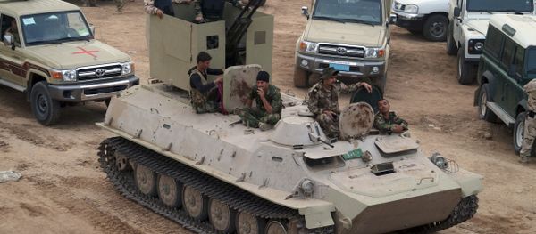Kurdish troops known as peshmerga prepare to attack Islamic State group positions during a military operation to regain control of some villages west of the oil-rich city of Kirkuk, 180 miles (290 kilometers) north of Baghdad, Iraq, Wednesday, Sept. 30, 2015. - Sputnik International