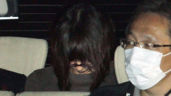 Naoko Kikuchi, an alleged former member of Japan's Aum Supreme Truth, is driven from the headquarters of the Tokyo Metropolitan Police in Sagamihara city, suburban Tokyo - Sputnik International