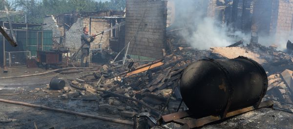 Private houses destroyed during an artillery attack by the Ukrainian army Private houses destroyed during an artillery attack by the Ukrainian army - Sputnik International