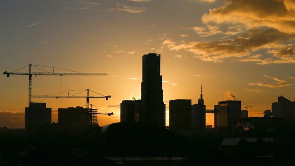 Buildings under construction are seen during a sunrise in central Brussels, Belgium, November 26, 2015 Buildings under construction are seen during a sunrise in central Brussels, Belgium, November 26, 2015 - Sputnik International