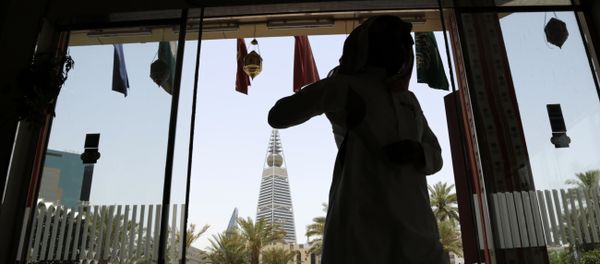 A Saudi man enters a hotel decorated for the Muslim holly month of Ramadan, Riyadh, Saudi Arabia, Monday, June 15, 2015. A Saudi man enters a hotel decorated for the Muslim holly month of Ramadan, Riyadh, Saudi Arabia, Monday, June 15, 2015. - Sputnik International