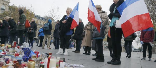 People hold French flags on the Place de la Republique in Paris, Friday, Nov. 27, 2015. - Sputnik International