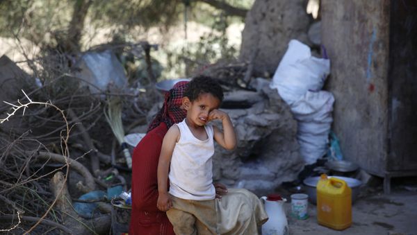 A boy cries after he receives a polio vaccination during a house-to-house polio immunization campaign in Sanaa, Yemen. Monday, Nov. 9, 2015. - Sputnik International