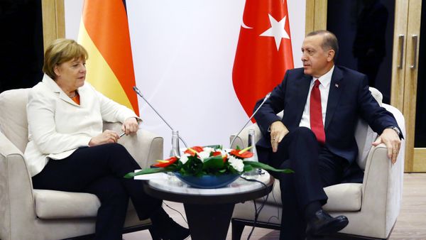 Turkish President Recep Tayyip Erdogan (R) meets German Chancellor Angela Merkel (L) during the G20 Summit in Antalya, on November 16, 2015 Turkish President Recep Tayyip Erdogan (R) meets German Chancellor Angela Merkel (L) during the G20 Summit in Antalya, on November 16, 2015 - Sputnik International