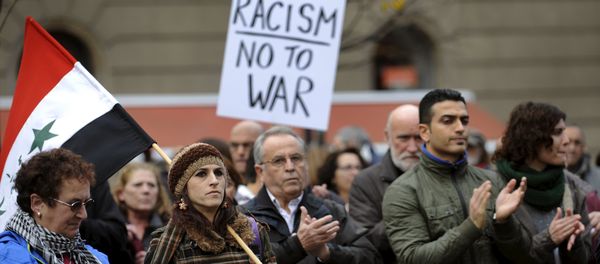 People attend a rally held in one of over 20 Spanish cities under the slogan Not In My Name, to protest against militant attacks and war, in Gijon, northern Spain, November 28, 2015. People attend a rally held in one of over 20 Spanish cities under the slogan Not In My Name, to protest against militant attacks and war, in Gijon, northern Spain, November 28, 2015. - Sputnik International