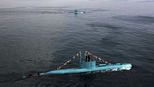 Iran's newly launched Ghadir submarines move in the southern port of Bandar Abbas in Persian Gulf, Iran Iran's newly launched Ghadir submarines move in the southern port of Bandar Abbas in Persian Gulf, Iran - Sputnik International