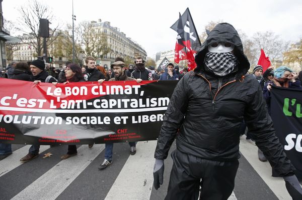 People demonstrate near the Place de la Republique after the cancellation of a planned climate march following shootings in the French capital, ahead of the World Climate Change Conference 2015 (COP21), in Paris, France People demonstrate near the Place de la Republique after the cancellation of a planned climate march following shootings in the French capital, ahead of the World Climate Change Conference 2015 (COP21), in Paris, France - Sputnik International