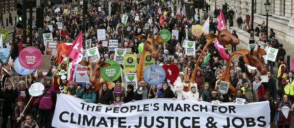 Protesters demonstrate during a rally held the day before the start of the Paris Climate Change Summit, in London, Britain November 29, 2015 - Sputnik International