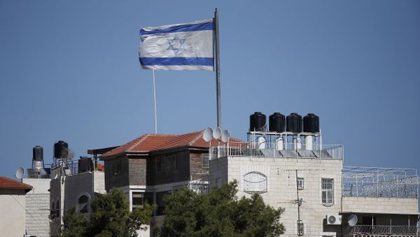 A giant Israeli flag flies over a settlement building situated in the middle of a Palestinian neighbourhood of Al-Tur in East Jerusalem, on November 11, 2014 A giant Israeli flag flies over a settlement building situated in the middle of a Palestinian neighbourhood of Al-Tur in East Jerusalem, on November 11, 2014 - Sputnik International