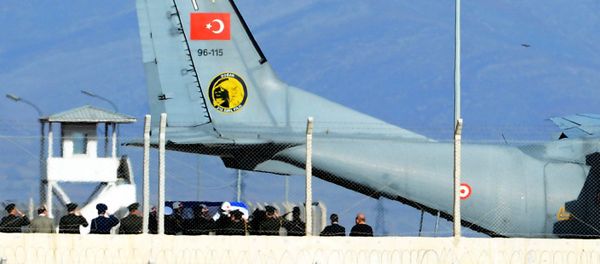 Turkish army officers salute as Turkish honour guard carry the coffin of Russian pilot Lt. Col. Oleg Peshkov into a Turkish Air force transport plane at Hatay airport, Turkey, Sunday, Nov. 29, 2015 Turkish army officers salute as Turkish honour guard carry the coffin of Russian pilot Lt. Col. Oleg Peshkov into a Turkish Air force transport plane at Hatay airport, Turkey, Sunday, Nov. 29, 2015 - Sputnik International
