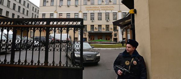 A police officer at the Prosecutor-General's Office in Bolshaya Dmitrovka Street, Moscow - Sputnik International