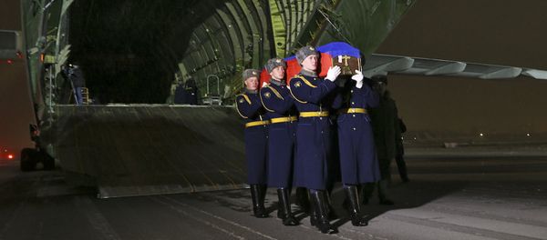 The body of the pilot of Russia's Su-24 bomber that was shot down by Turkey last week has arrived at the Chkalovsky Airport near Moscow - Sputnik International