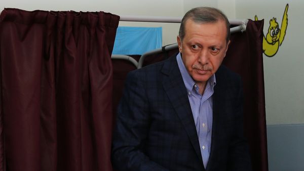 Turkey's President Recep Tayyip Erdogan leaves a voting booth as he prepares to cast his vote at a polling station, in Istanbul, Sunday, Nov. 1, 2015 Turkey's President Recep Tayyip Erdogan leaves a voting booth as he prepares to cast his vote at a polling station, in Istanbul, Sunday, Nov. 1, 2015 - Sputnik International